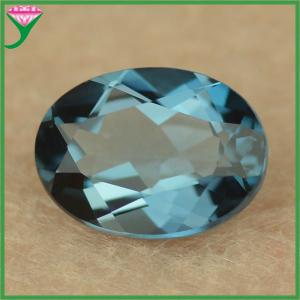 China Natural Oval Shape Star Loose Natural Gemstone London Blue Topaz Price Per Carat on sale