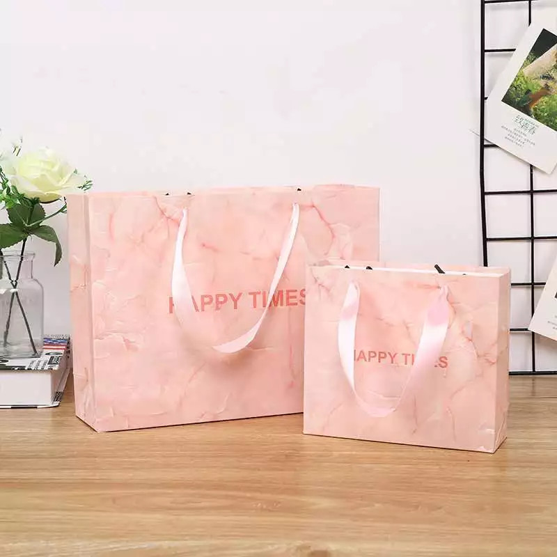 China Customized Logo 180gsm-500gsm Boutique Paper Bag With Handles on sale