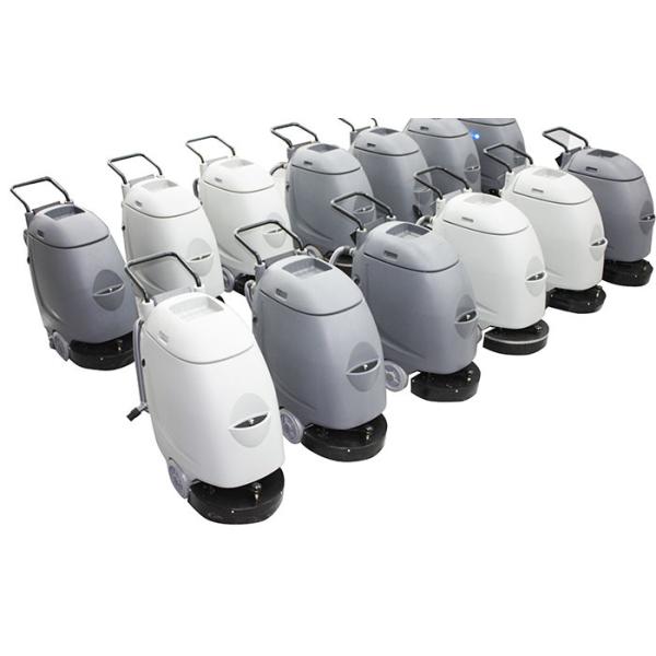 White Floor Scrubber Dryer Machine Running Alongside Pressure Additional System