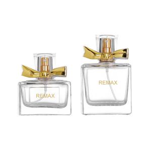 Cheap Luxury 50ml Glass Perfume Bottle 10000pcs With Gold Bow Cap for sale