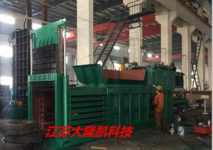 China Horizontal Paper Baler Machine Manual Strapping Conveyor Feeding Material on sale