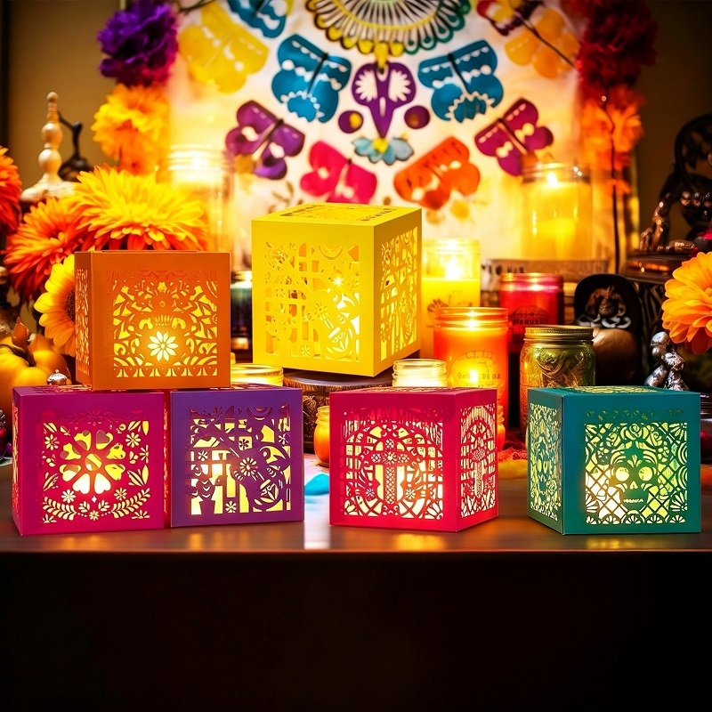 Mini paper luminaries with calavera cut-outs for ofrenda altars