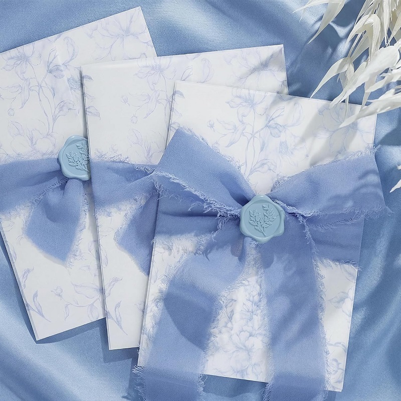 Custom vellum jacket wedding invitation cards with wax seal and ribbon