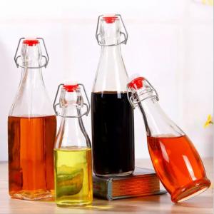 Cheap Glass Bottle Sealing Type Cork 150ml 250ml 500ml 1000ml Round Shape Swing Top Wine Whiskey Bottles for sale
