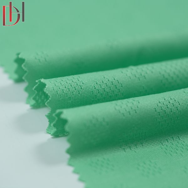 Garment Breathable Knitted Fabric 100% Polyester Textile Jacquard Clothing Fabric