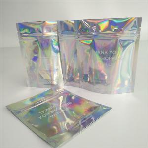 China Stand Up Cosmetic Pouch Makeup Bag Fashion Clear Shinny Bag Pouch Holographic Hologram Cosmetic Bags on sale
