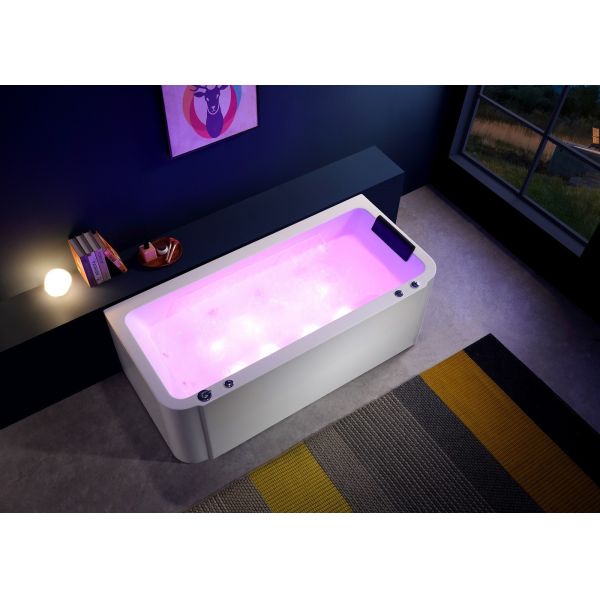 Massage Bathtub With Integrated Apron And Freestanding Chrome Waterfall Tap